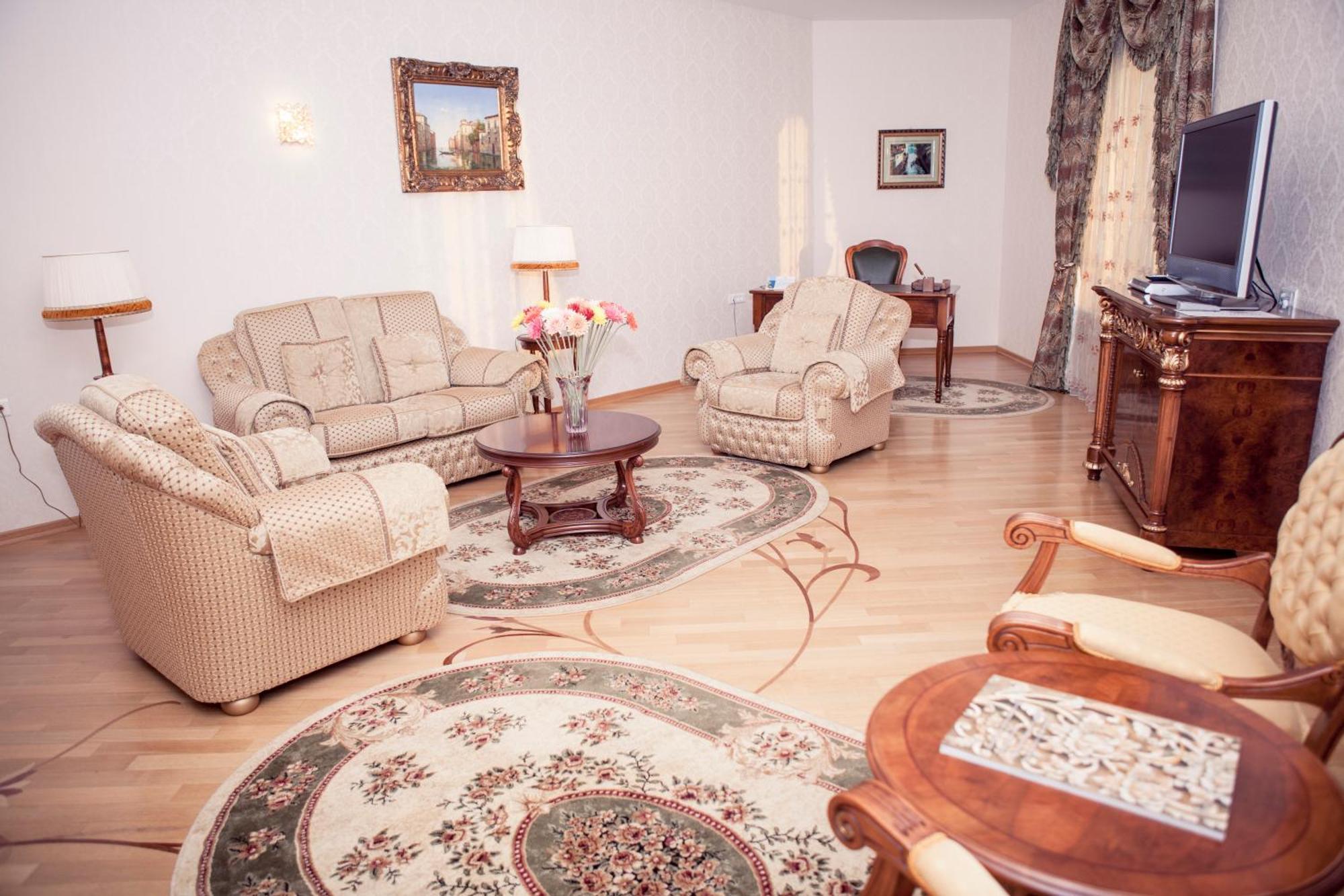 Grand Hotel Victory Aktau  Exteriér fotografie A living room
